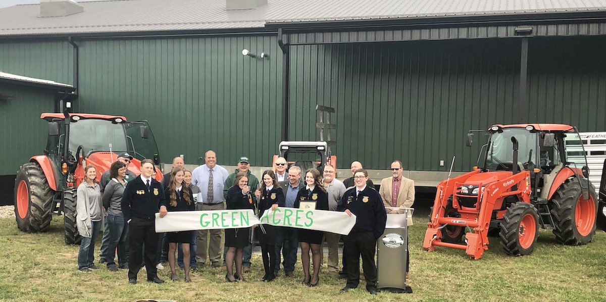 Students and instructors celebrate the ribbon cutting of Green Acres in Noble County