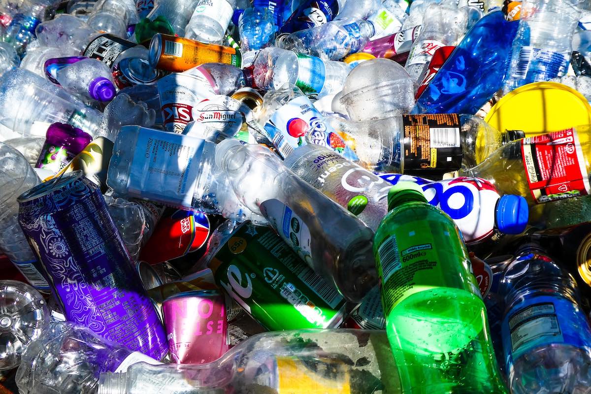 Large number of recycled bottles in bin