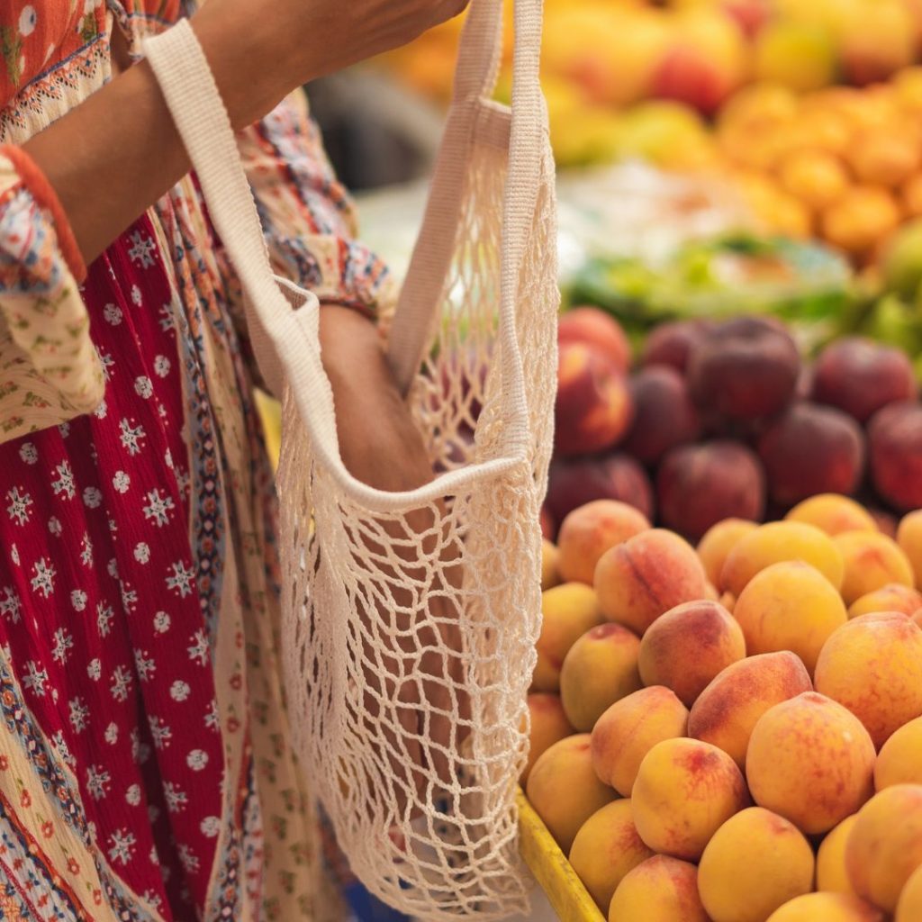 Up close shot of reusable mesh bag used to hold groceries