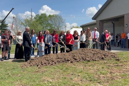 Officials take part in a groundbreaking ceremony