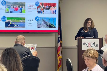 Buckeye Hills Executive Director Chasity Schmelzenbach presents the 2024 Annual Report to the General Policy Council.