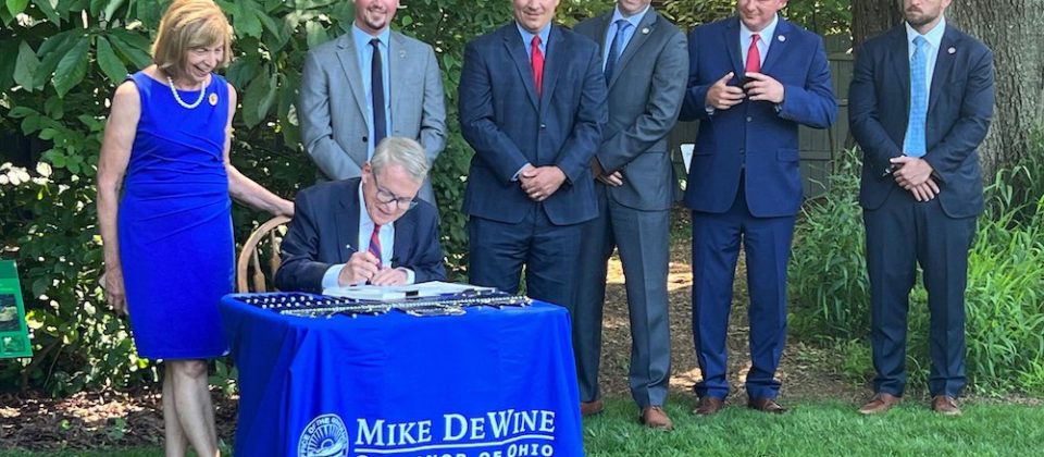 Governor Mike DeWine Signing Bill outdoors