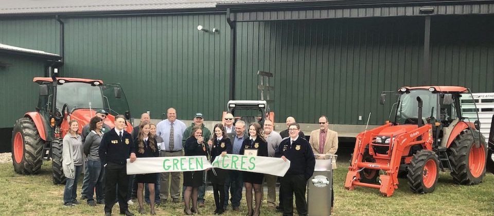 Students and instructors celebrate the ribbon cutting of Green Acres in Noble County