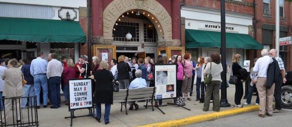 Twin City Opera House event with people waiting in line
